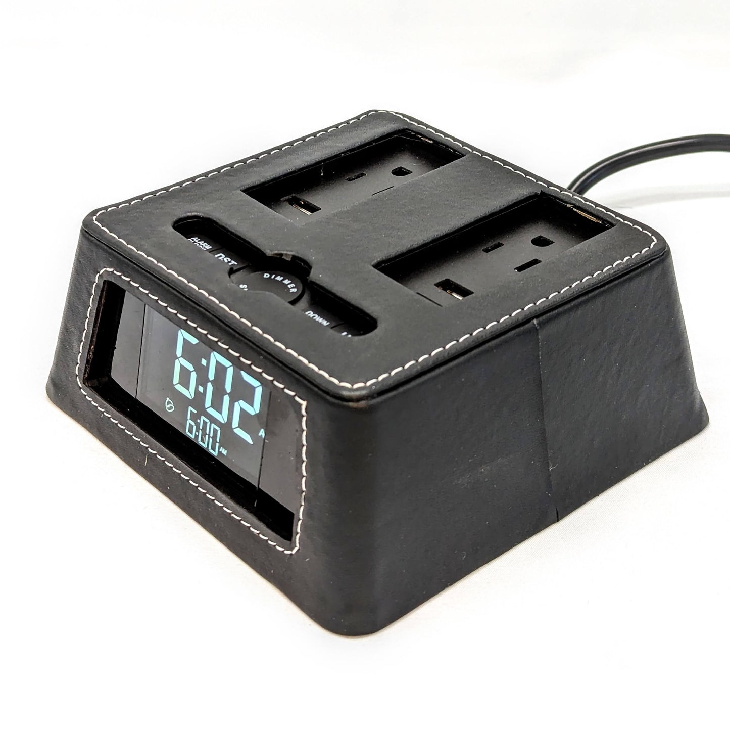 Power Hub Ultra Clock with black leatherette cover.  A charging and power hub that fits the bill for hotels, vacation rentals and general home use.